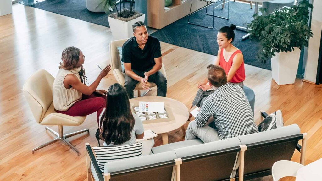 a group of people sitting in chairs having a discussion title search in North Carolina how to find liens on property