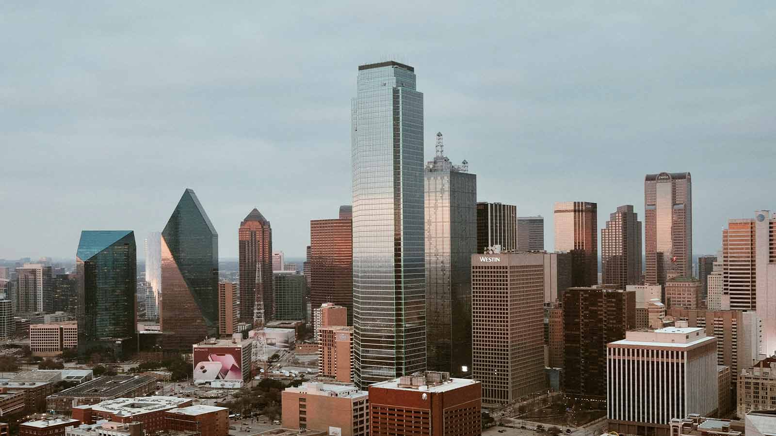 a city skyline with tall buildings example of How to Find Liens and Title Search in Texas
