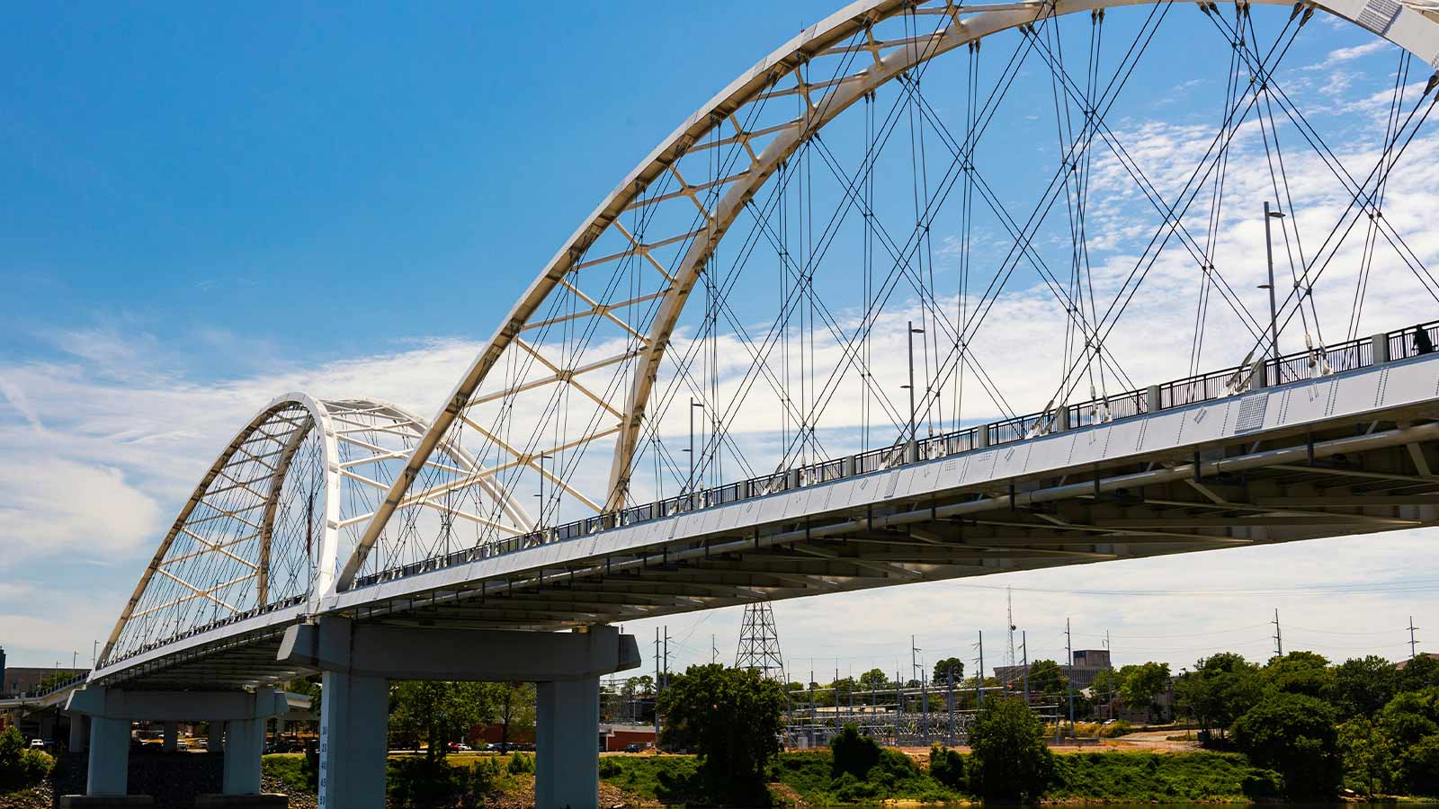 a bridge with a train going over it Arkansas Title Search