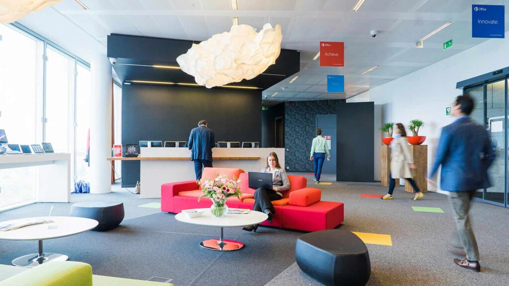a woman sitting on a couch in a lobby AFX Research and Mortgage Automator Partner to Deliver Lightning-Fast Title Updates for Private Lenders