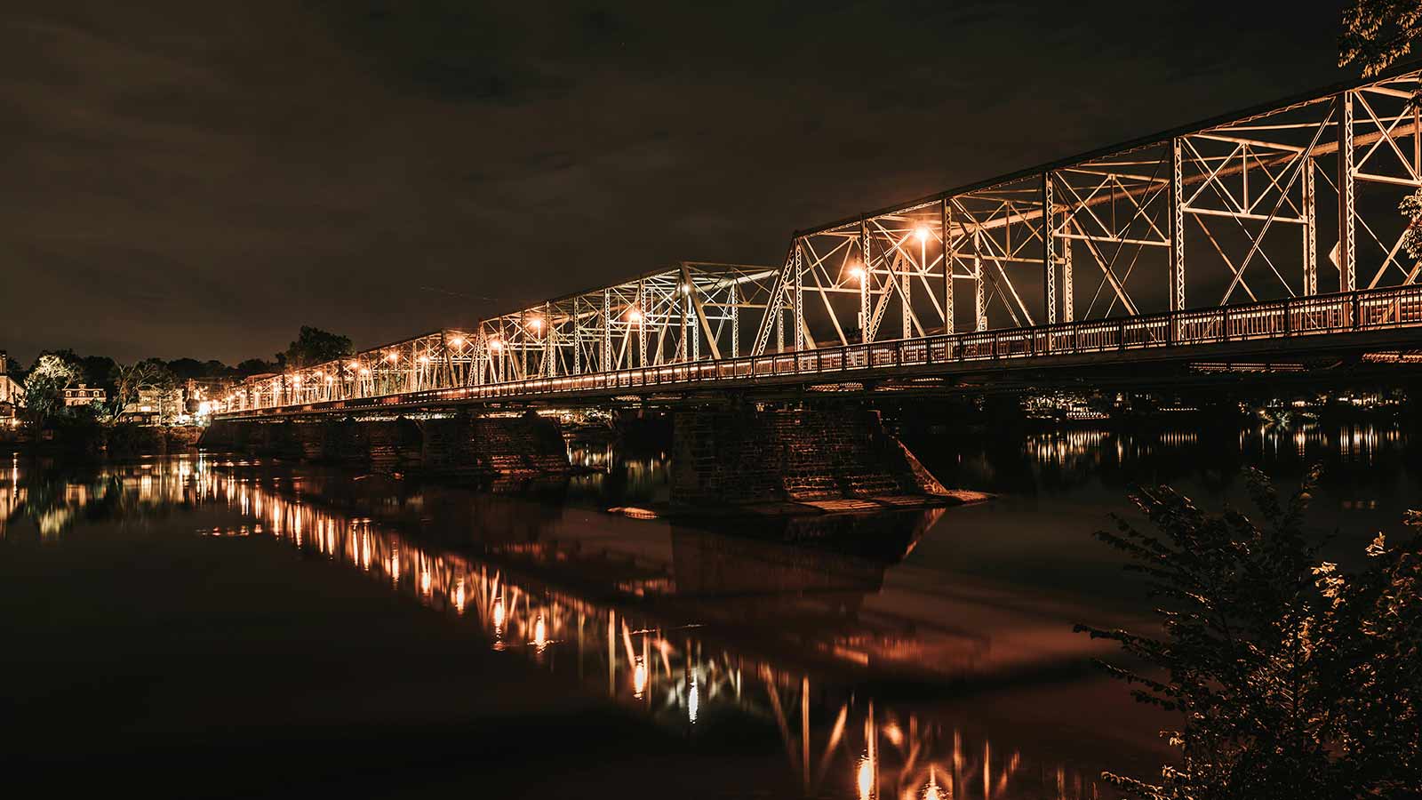 a bridge over water at night delaware title search and encumbrance