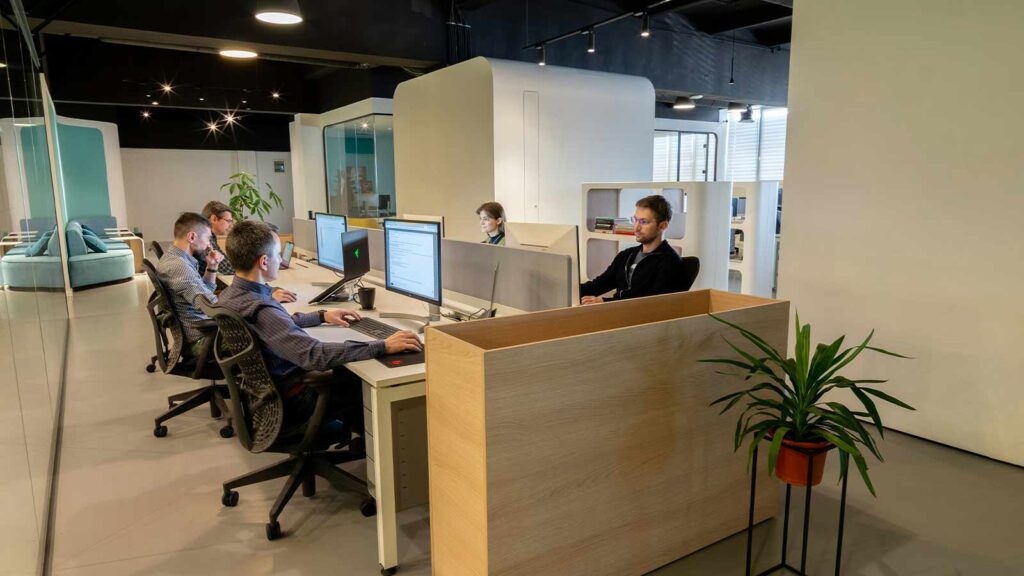 a group of people sitting at computers title company title insurance title services best online title search company best title search company in montana title search companies that work nationwide