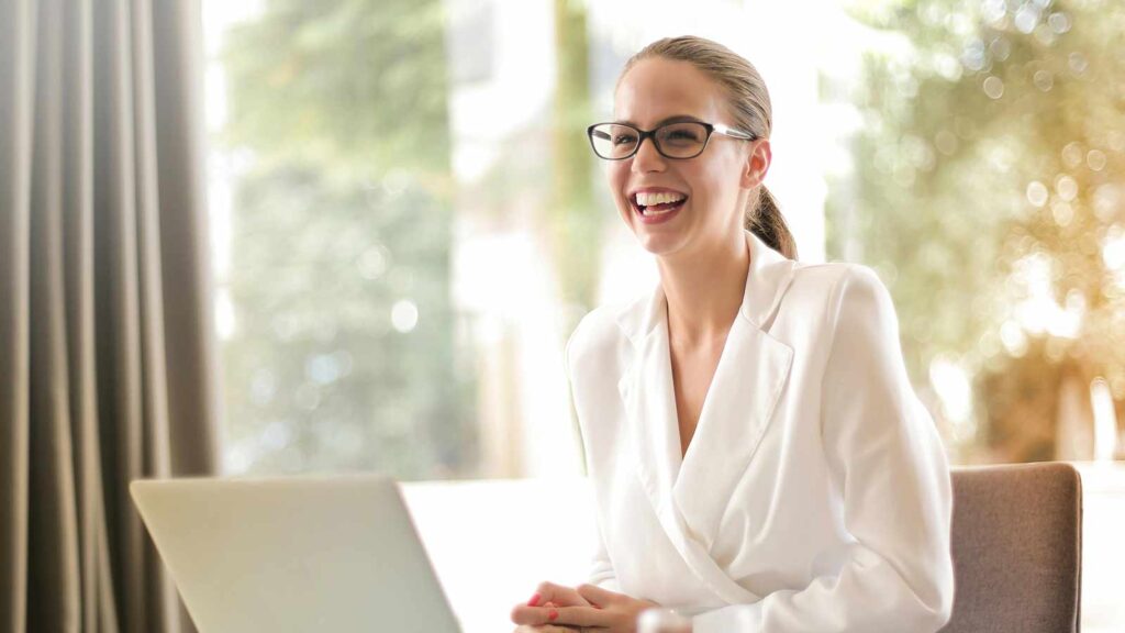 a woman in white suit smiling Alaska Title Search: Fast, Reliable Reports from AFX Research