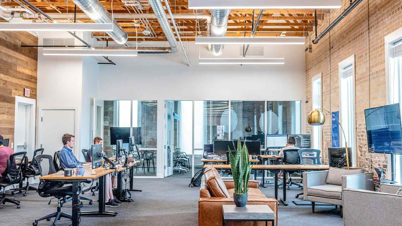a group of people working in an office API integrations