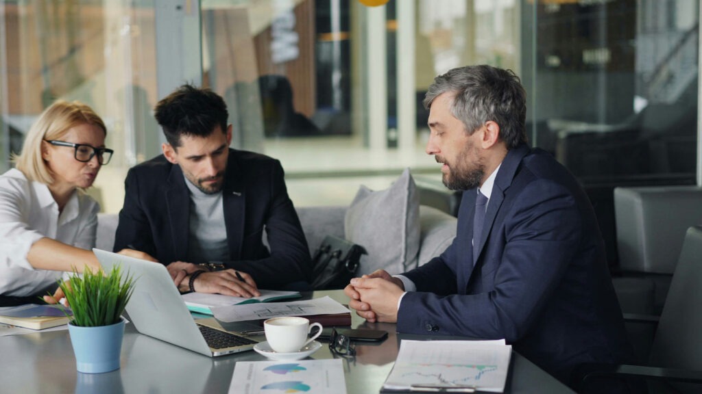 Business meeting with focused discussion. Lien Search