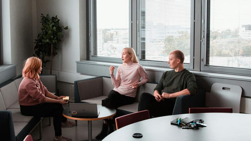 Group discussion in modern office setting. artificial intelligence titles escrow what is escrow title company title company near me