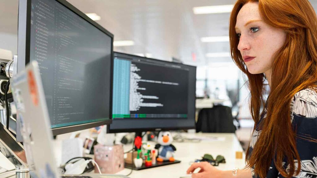 women working on code AI Title Search in West Virginia