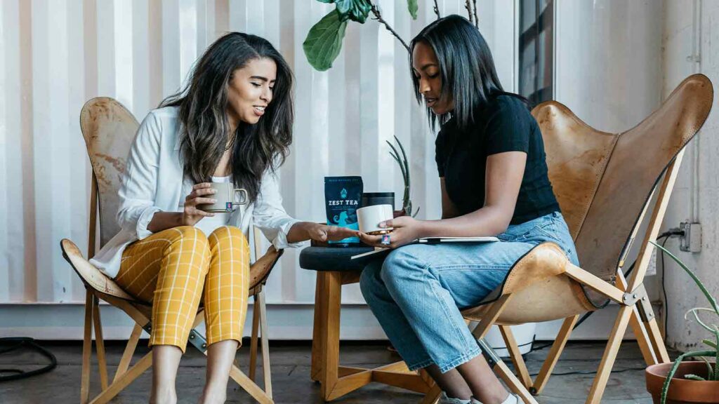 people sitting talking about Real Estate Title Search